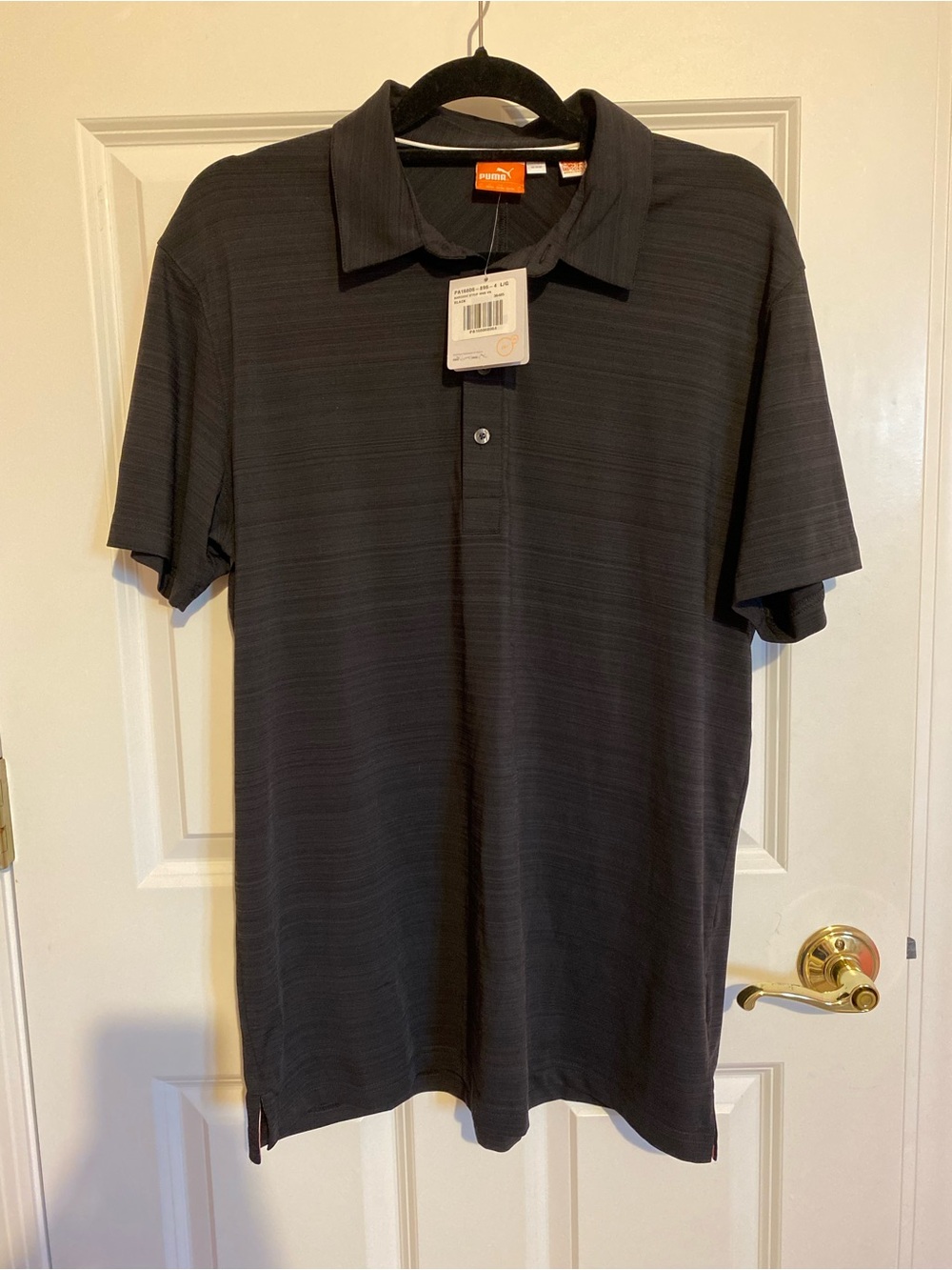 Puma men's dry cell black polo shirt, size large. New with tags